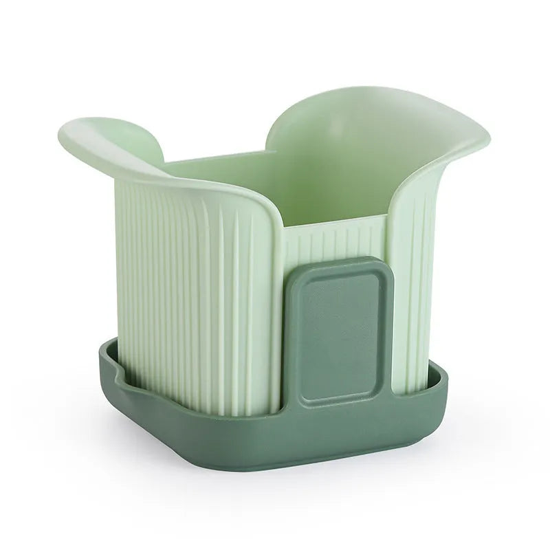 Green manual vegetable chopper with stainless steel cutting grid for slicing onions, potatoes, radishes and cucumbers