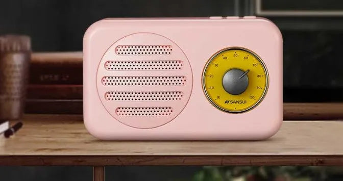 Portable Bluetooth speaker with FM radio in vintage green, pink or wood colour finish