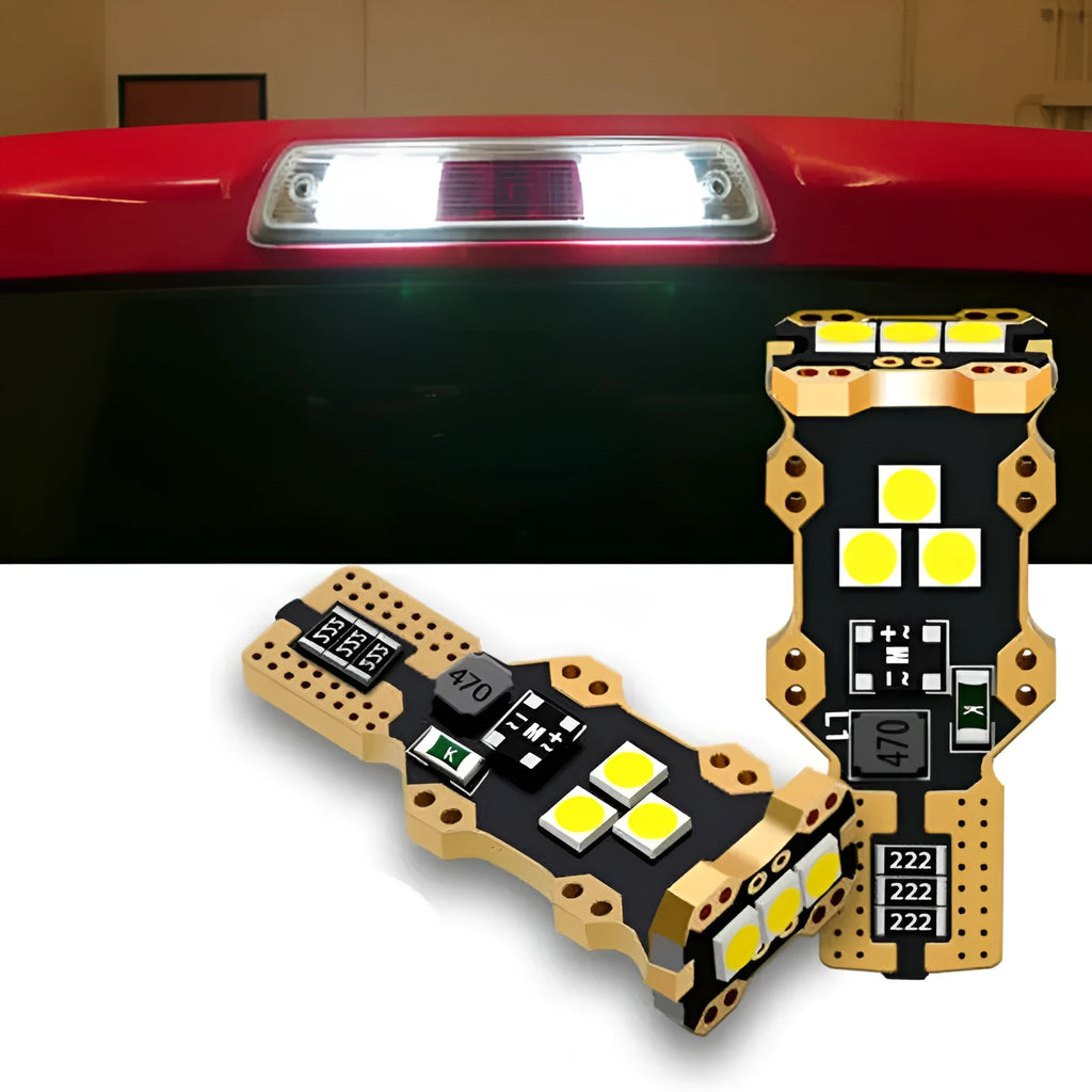 Single white T15 automotive reverse light bulb with PVC housing on a plain background.