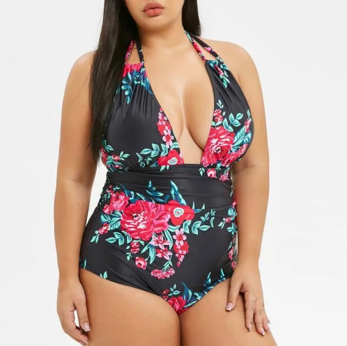 Printed black one-piece swimsuit made from polyester fibre, full coverage design, available in sizes XL to 5XL