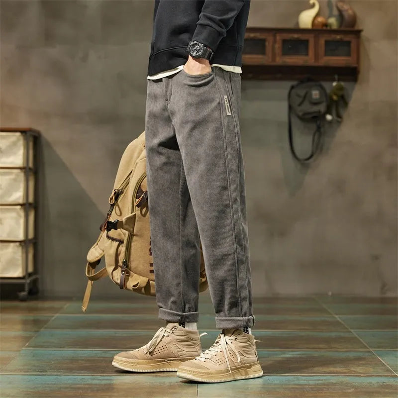 Corduroy men's casual trousers with straight leg and tapered street fashion styling