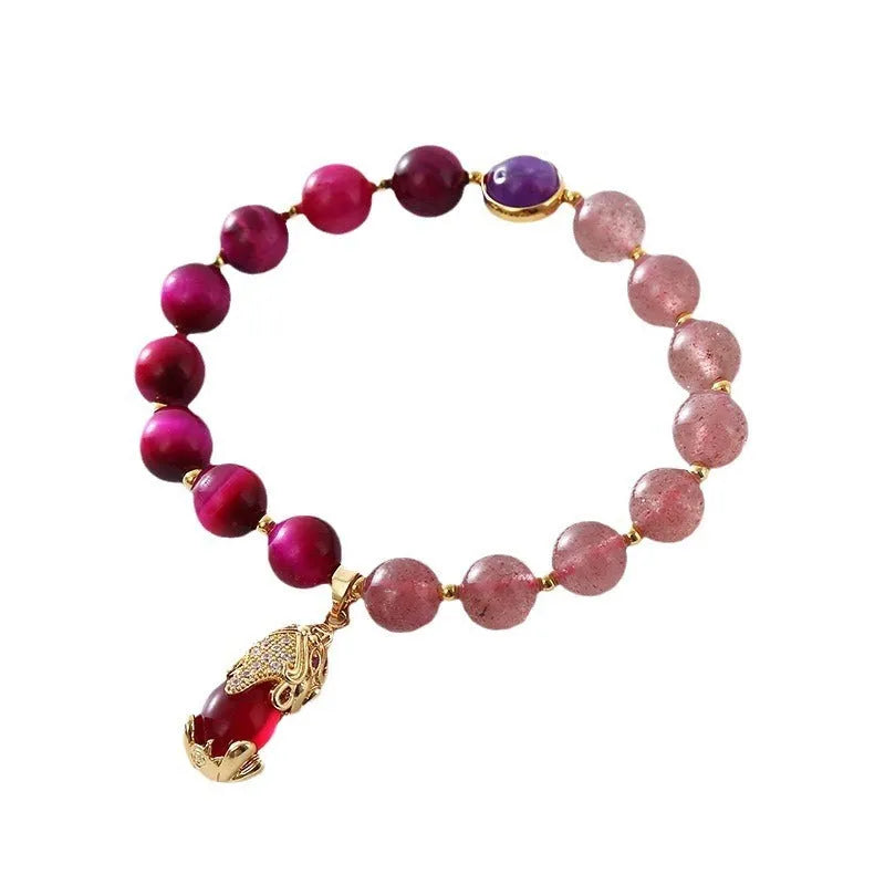 Women's simple strawberry crystal bracelet on an 18cm elastic band.