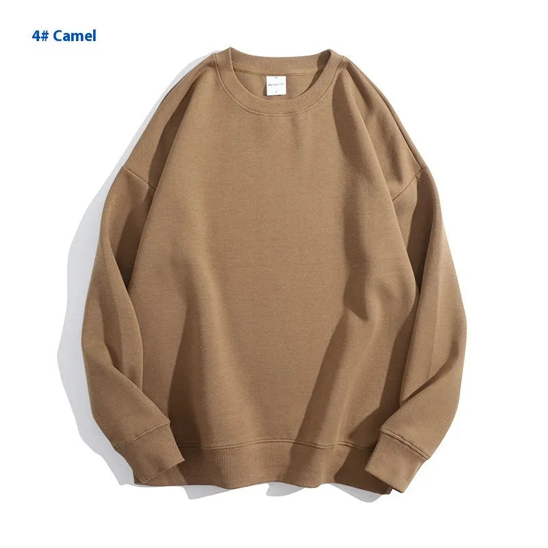 Cotton off shoulder pullover sweater in a loose fit, shown in a solid colour with long sleeves.