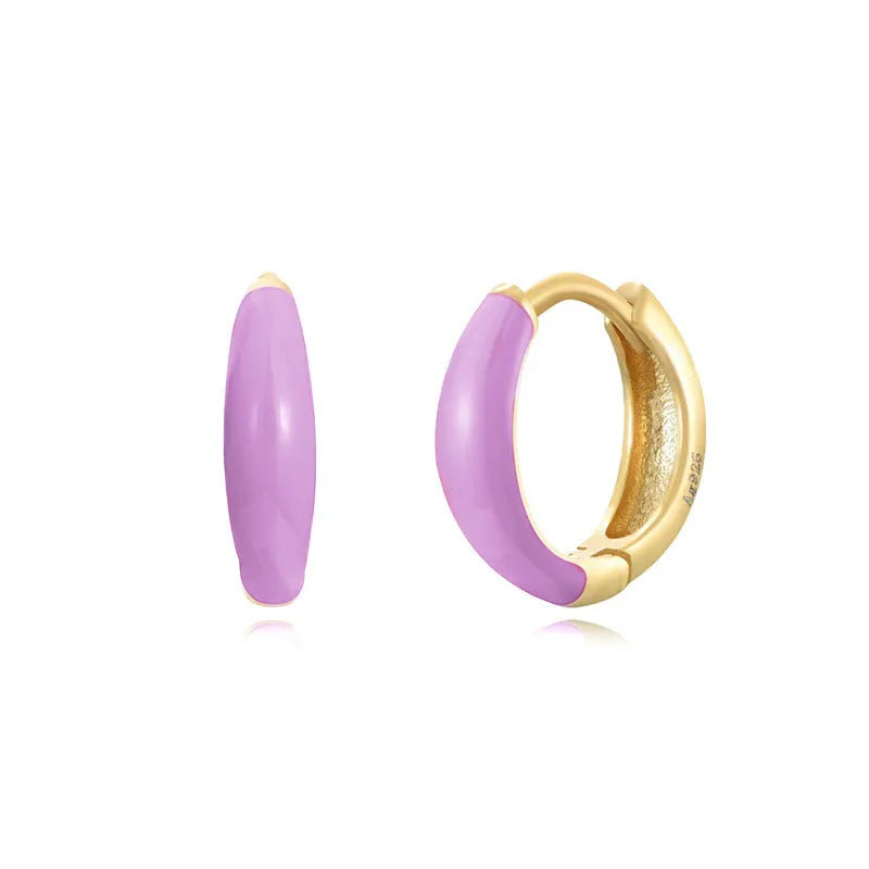 Oval-shaped curved drop earrings with colourful epoxy resin drip finish and silver metal pin.
