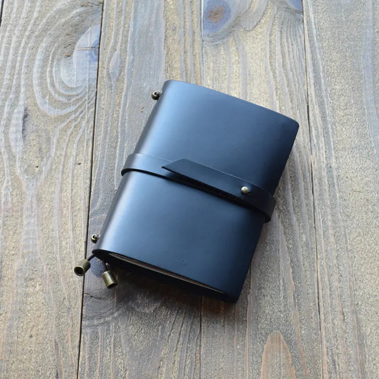 Creative carved cowhide passport cover in genuine leather, front view, with texture detail