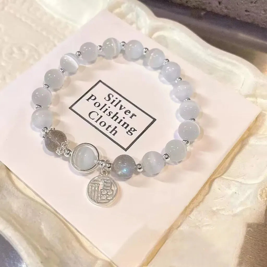 Glass butterfly bracelet for women with drop-shaped coloured glaze beads in grey moonlight colour option