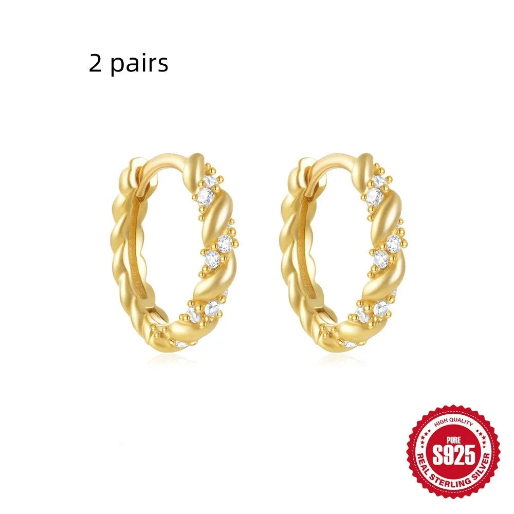 Small round geometric sterling silver stud earrings with diamond accents in gold or silver finish