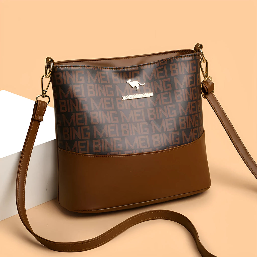 Brown soft PU leather messenger bag with organisation compartments and urban simplicity design