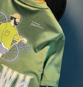 Green men's loose fit t-shirt with a literary youth print on the front, short sleeves.