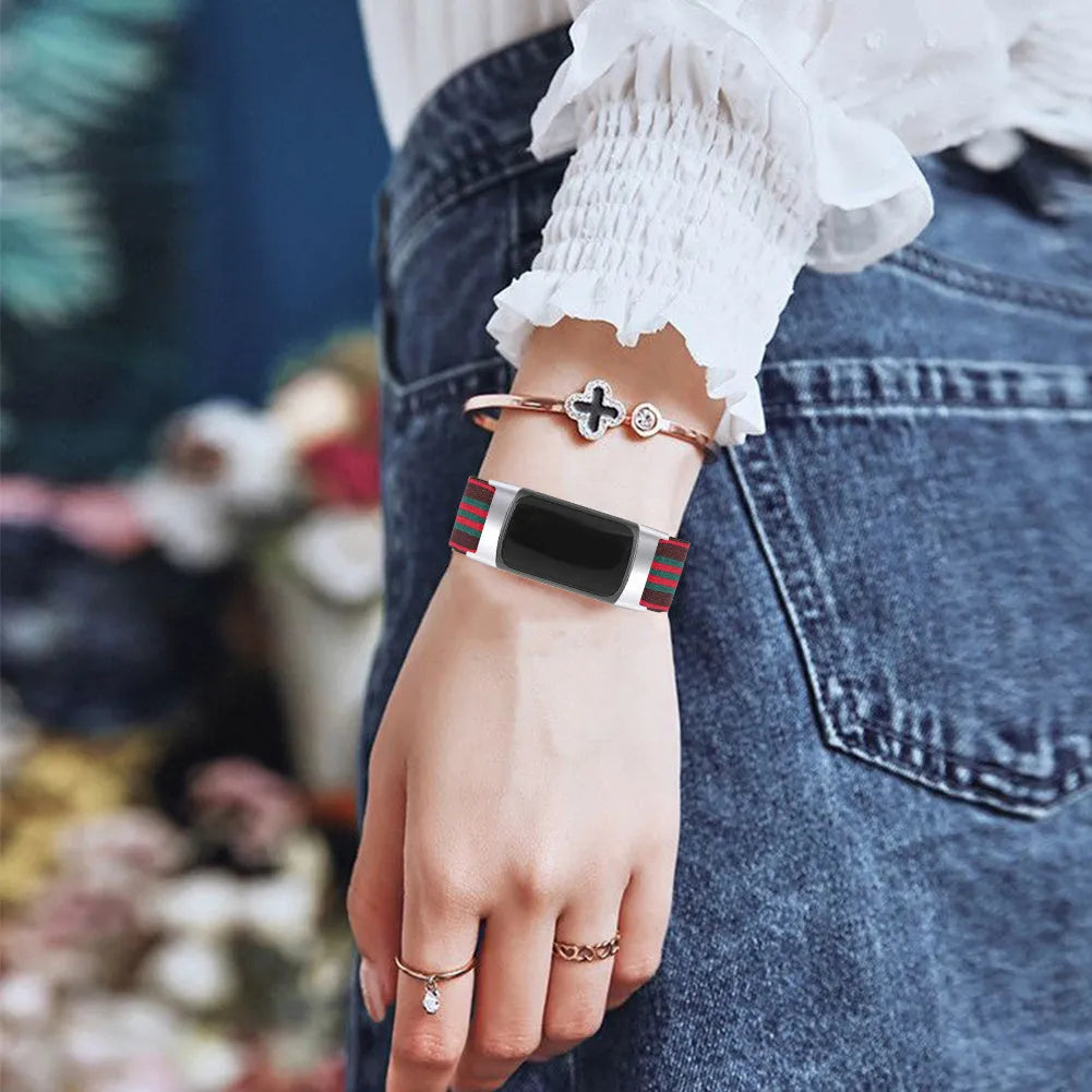 Printed elastic replacement watch strap compatible with Fitbit Charge 6, shown in an adjustable length.