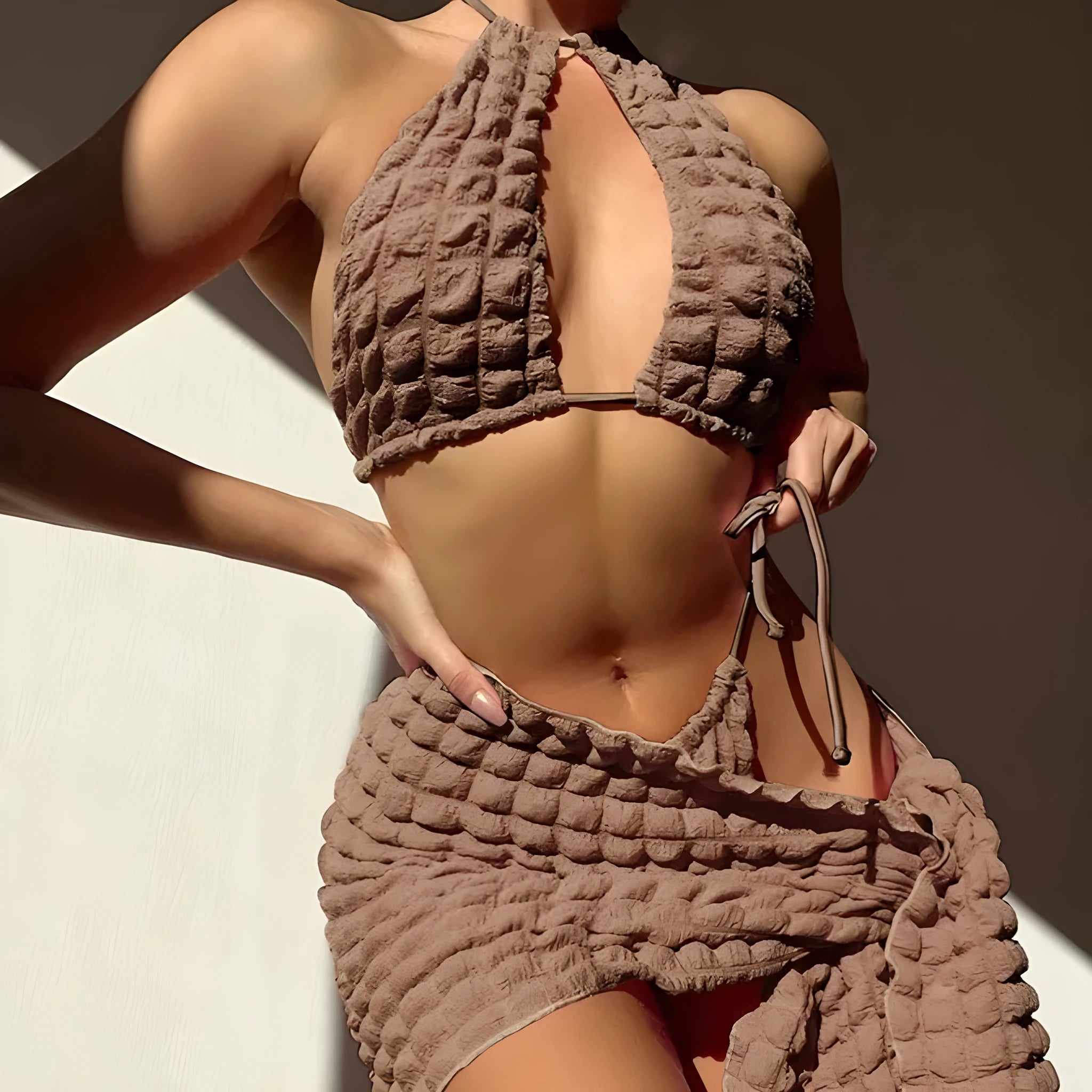 Brown seersucker women's three-piece swimsuit with lace-up bikini top and skirt bottom