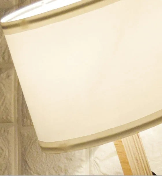 Creative wooden humanoid table lamp with white fabric shade, deformable design, 22x44x16cm