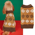 Grey dog sweater with white snowflake pattern on a small dog, showing knitted acrylic texture.