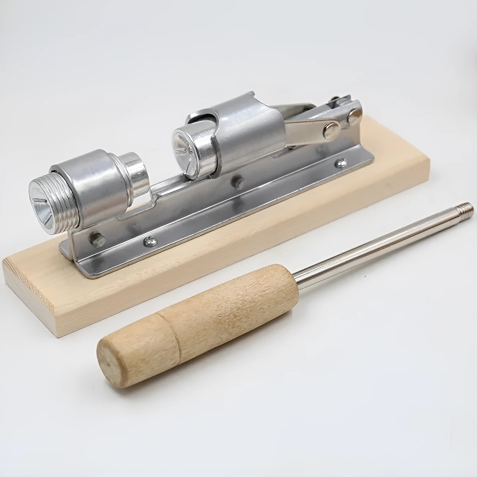 Mechanical walnut cracker tool with wooden board base and aluminium lever mechanism