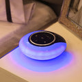 Blue Creative Bluetooth speaker desk lamp with foldable LED light and touch controls on a desk