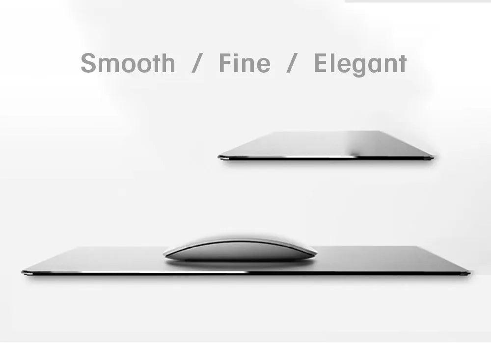 Aluminium alloy double-sided mouse pad in black finish on a desk for gaming or office use