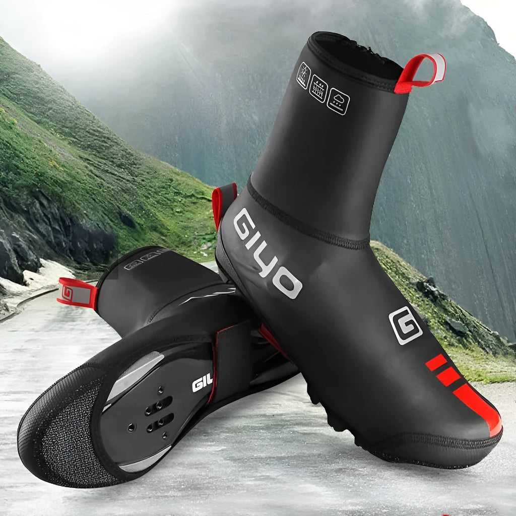 Giyo black cycling waterproof shoe covers with Kevlar and PU construction on a road bike