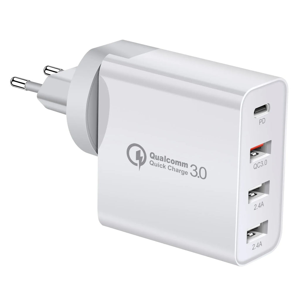 Black and white four-port USB-C wall charger with interchangeable UK, US, EU, and AU plug heads.
