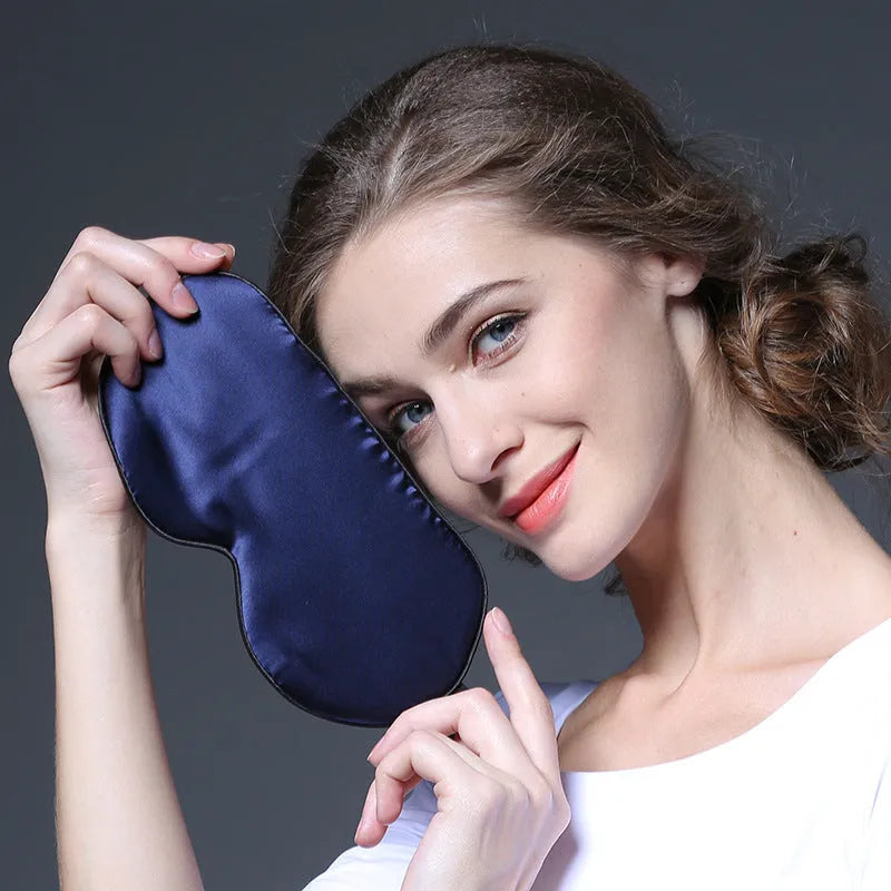 Double-sided mulberry silk eye mask in black with embroidered design, 22x11cm shaded view