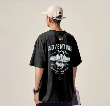 Men's black loose fit short-sleeved t-shirt on a hanger