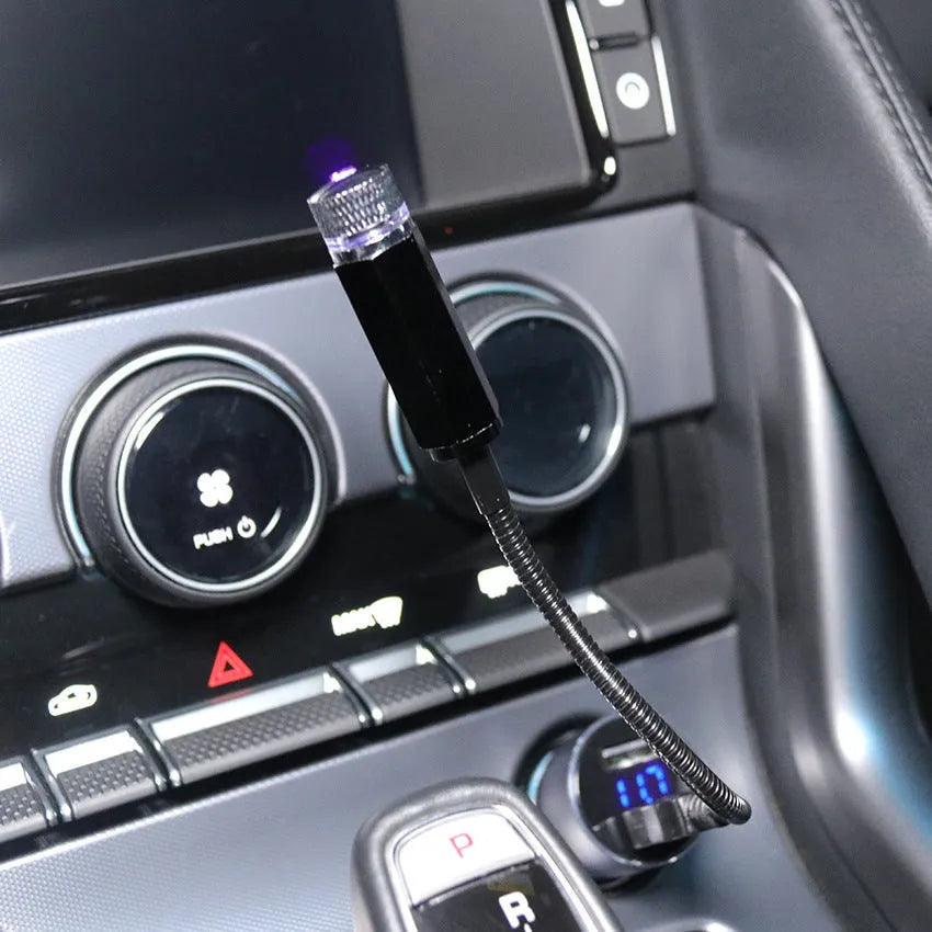LED car roof star night projector light with purple glow on ceiling