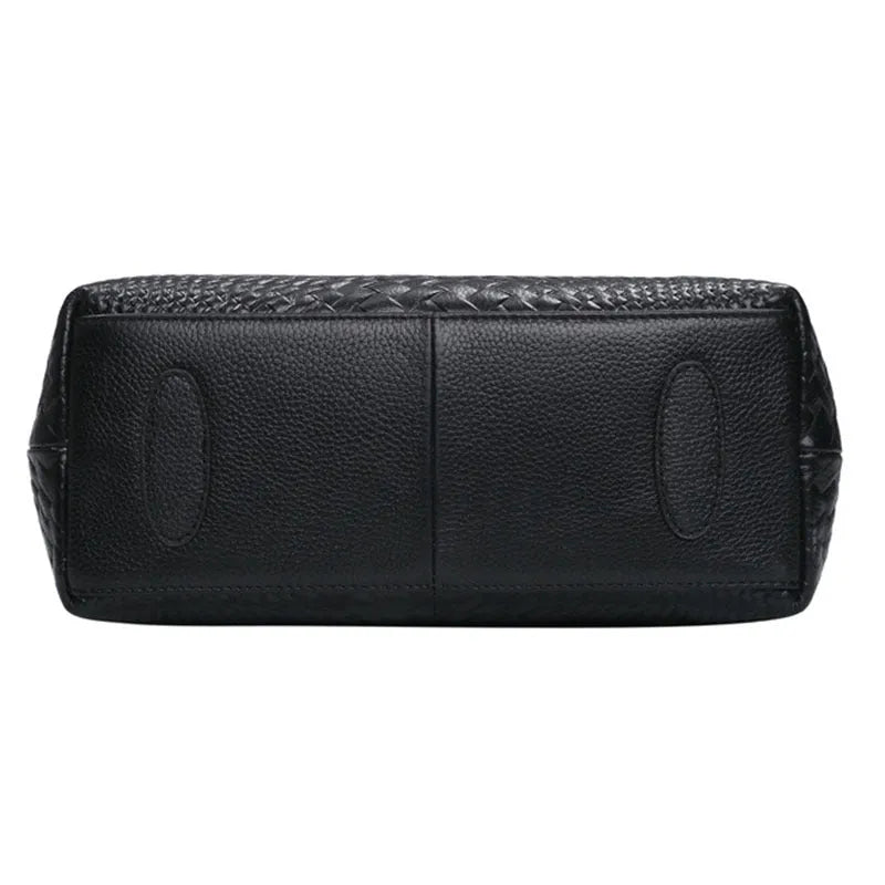 Genuine leather women's woven crossbody bag in black with embossed finish and soft handle