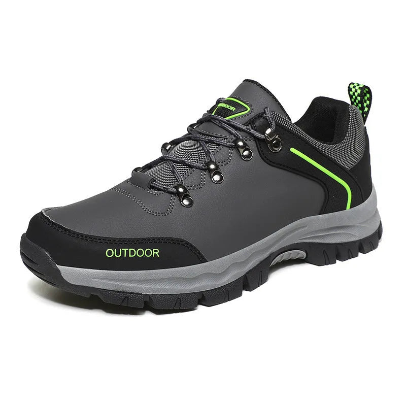 Men's black hiking shoes with synthetic leather upper and non-slip TPR outsole on outdoor trail