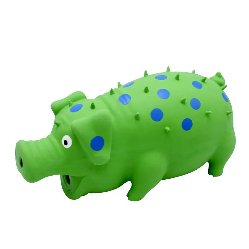 Pig-shaped latex dog chew toy with textured surface and squeaker in various colours