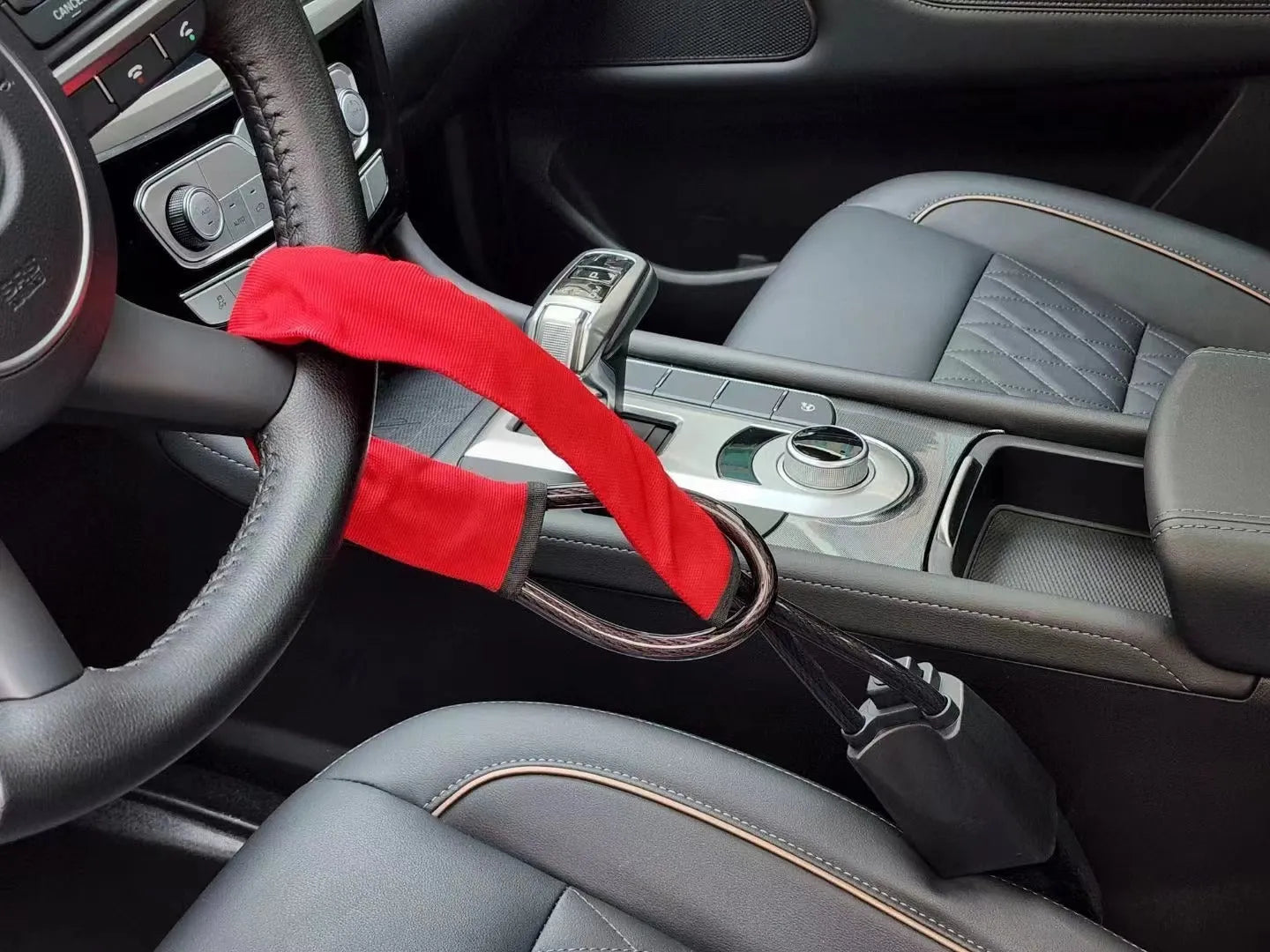 General Motors steering wheel lock with iron wire rope and copper lock mechanism in three colour options