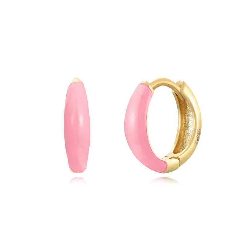 Oval-shaped curved drop earrings with colourful epoxy resin drip finish and silver metal pin.