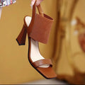Women's black high heel sandals with elastic strap and rubber sole