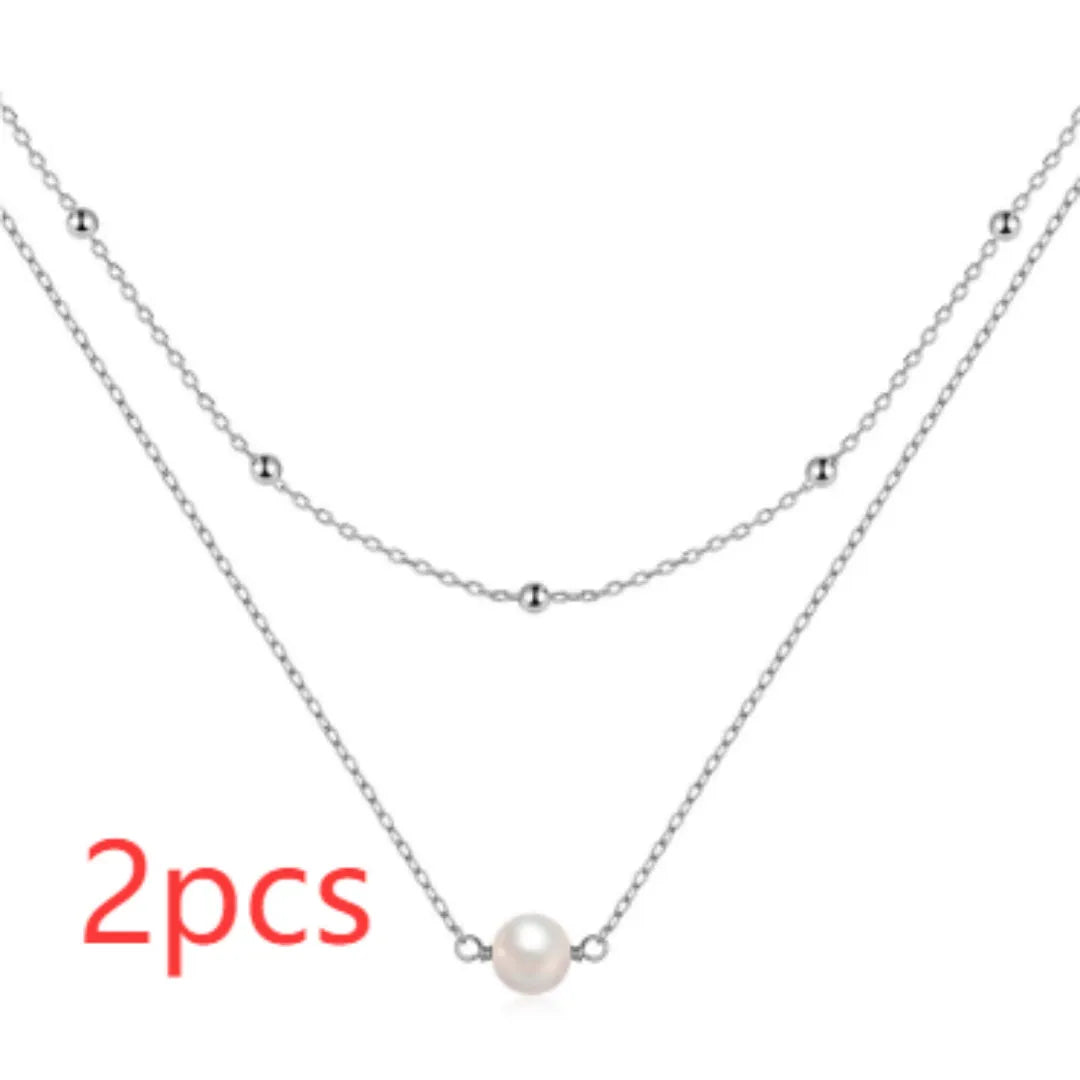 S925 sterling silver women's necklace with double-layer design and twin pearls in gold or white gold plating