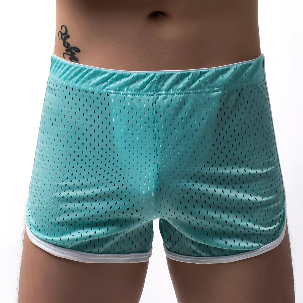 Men's black three-point boxer shorts made from a knitted cotton and nylon blend on a plain background.