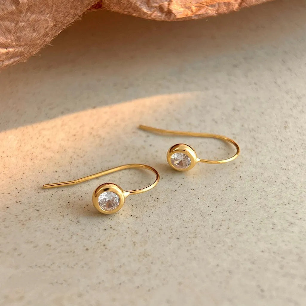 Round zircon earrings for women in minimalist geometric style, light luxury finish, simple zircon colour, one pair
