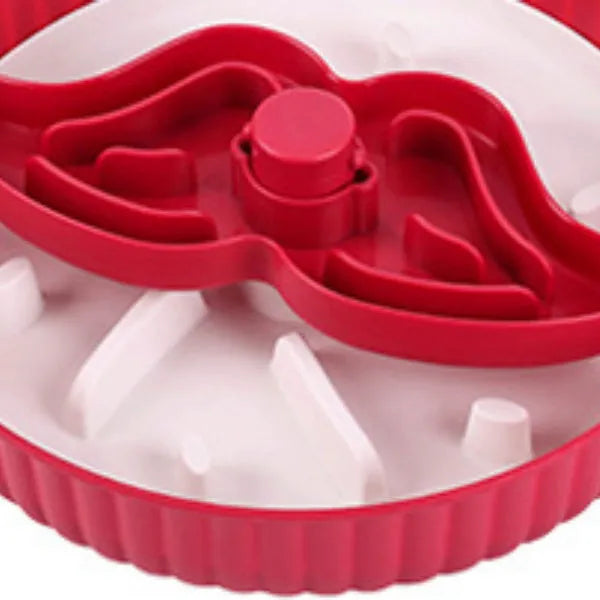 Slow feeder dog bowl with rotating game board and textured silicone licking mat insert.