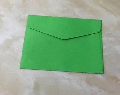 Mini coloured envelopes in assorted colours showing 11.5cm by 8cm dimensions and western-style flap