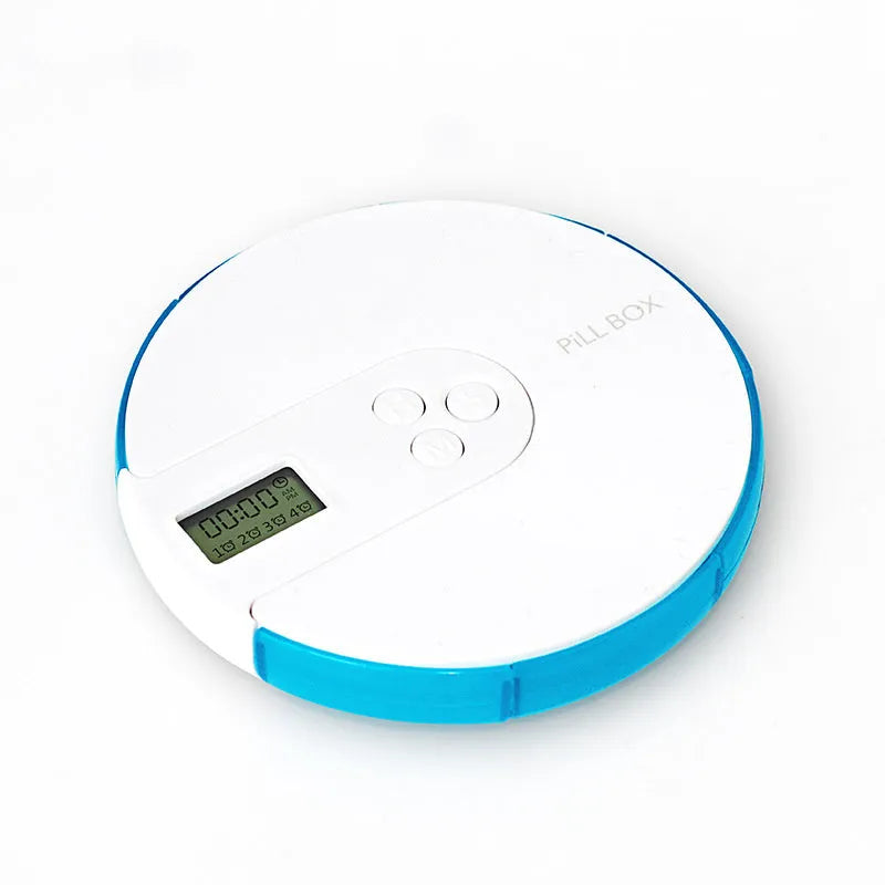 Seven-compartment alarm clock pill dispenser in blue, showing timer display and storage lids.