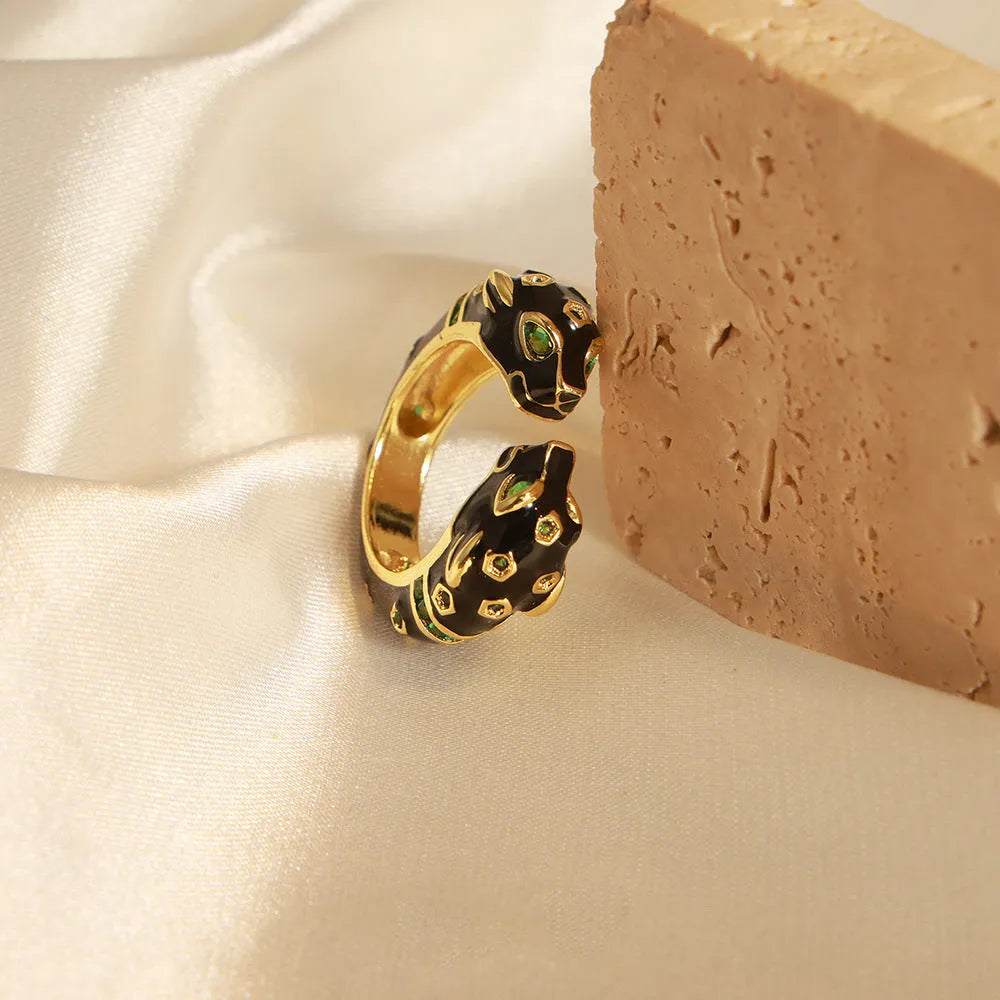 Women's geometric copper ring with electroplated black cheetah pattern design