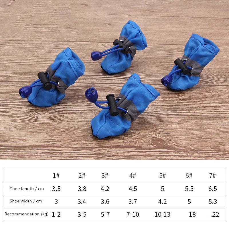 Set of cloth soft soled pet shoes for dogs in various colours on white background