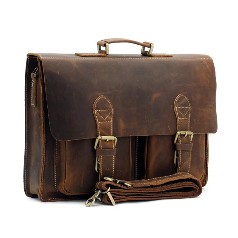 Small yellow brown Crazy Horse leather messenger bag with shoulder strap and nylon lining.