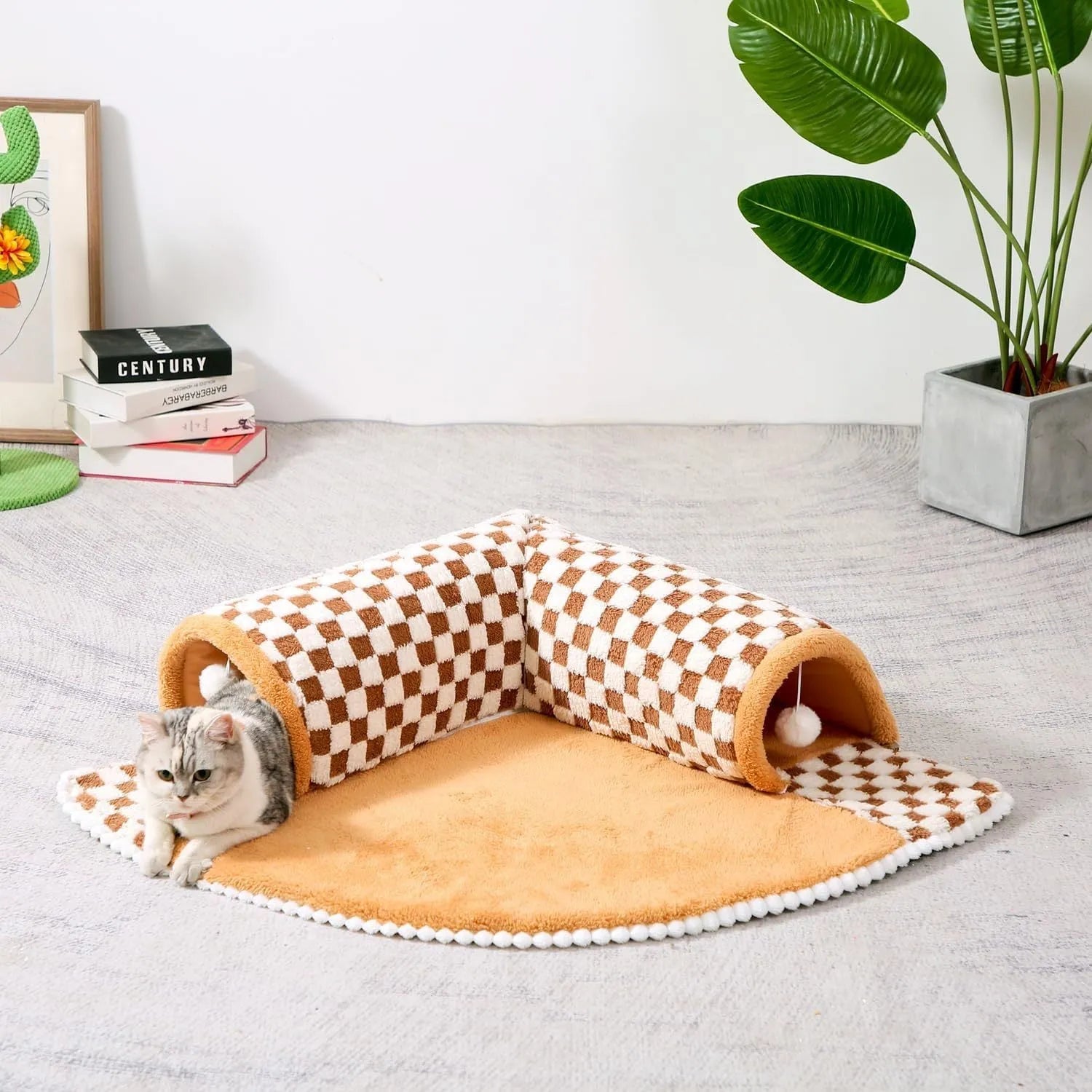 Coffee-colour fan-shaped plush pet bed tunnel for dogs and cats with a thick padded mat and anti-slip base.