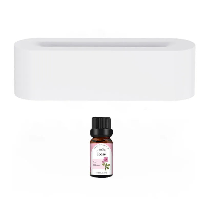White square ultrasonic flame aroma diffuser and humidifier with LED light on a table.