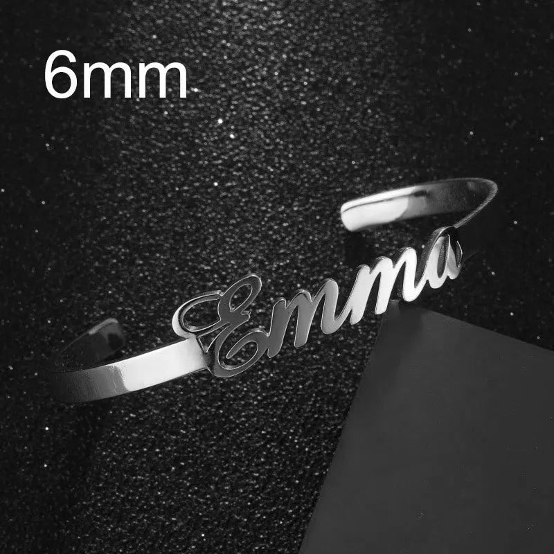 Customised name bracelet in stainless steel with silver finish and 10mm width on display