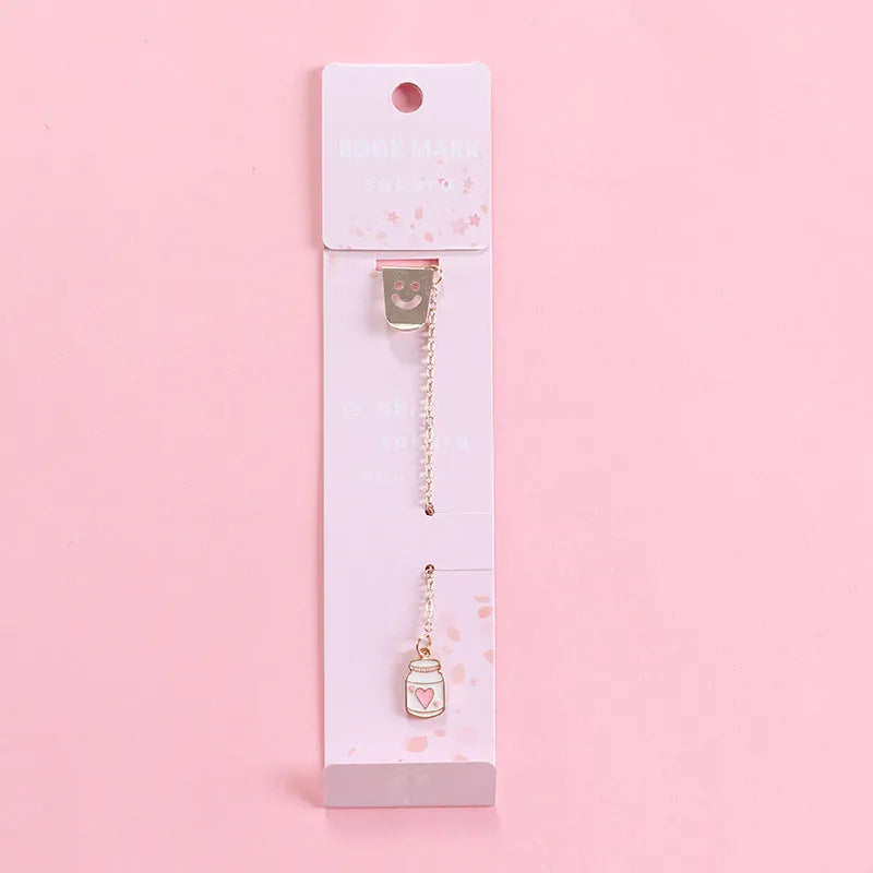 Metal bookmark with cartoon pendant in choice of animal and object designs
