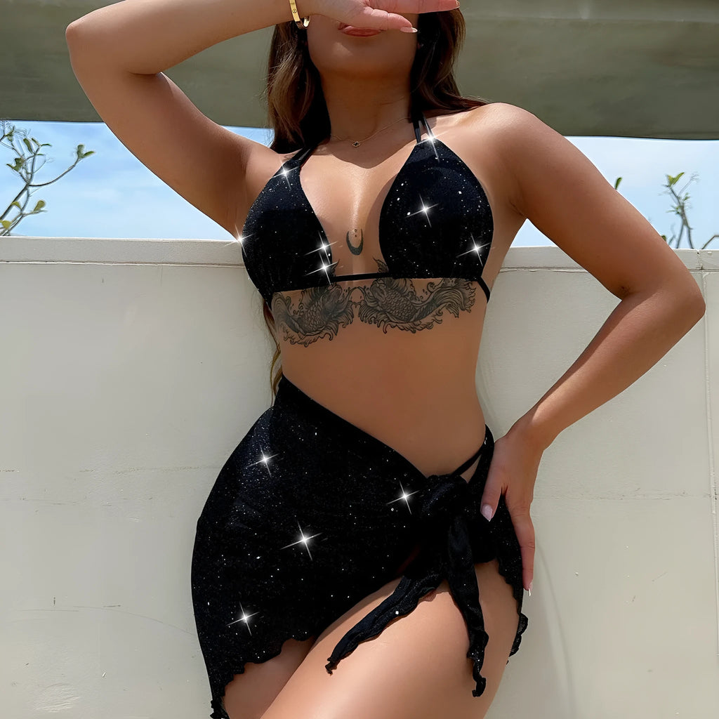 Black three-piece swimsuit bikini set with high-waisted shorts on mannequin