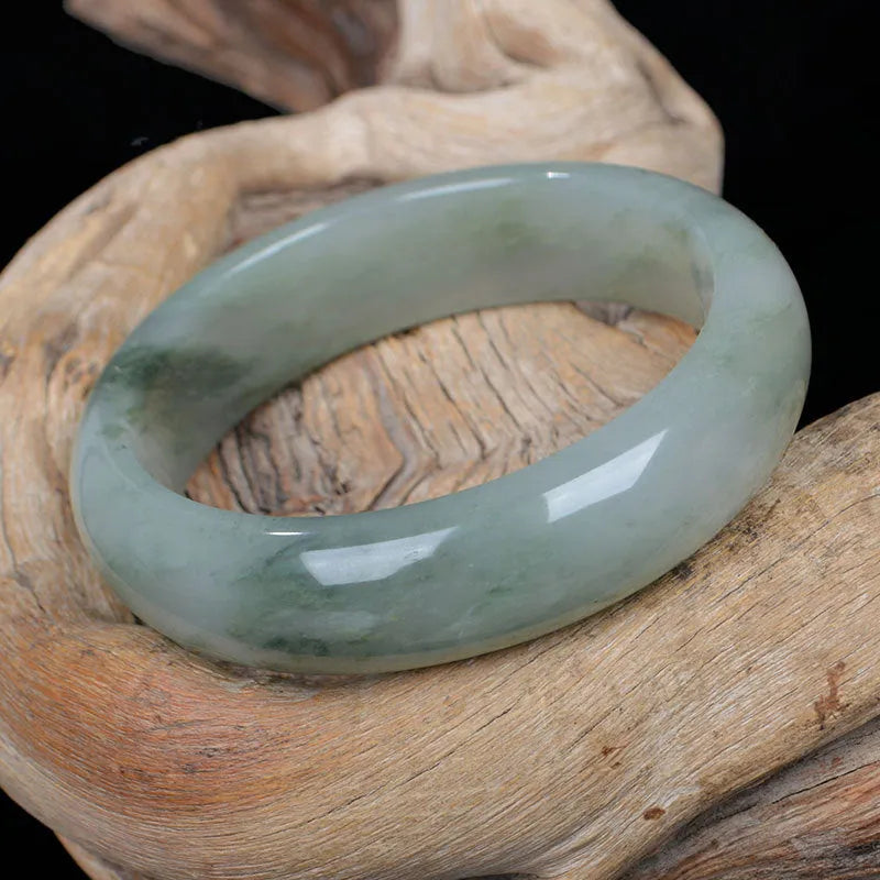 Natural Jinsi Jade Chinese style bracelet showing its solid construction on a neutral background.