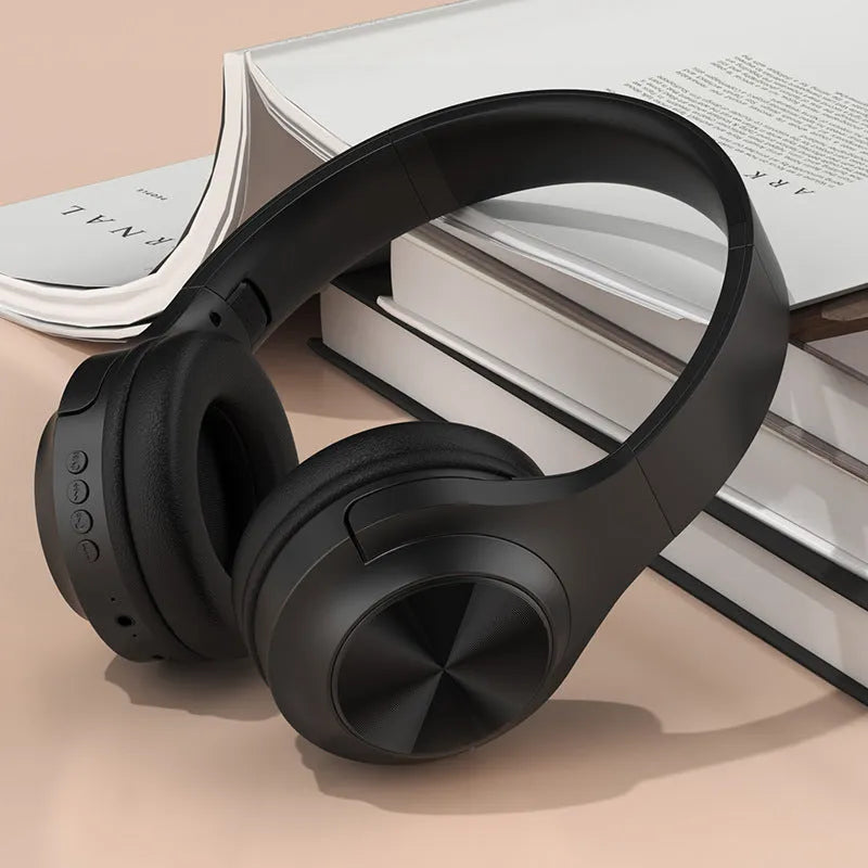 Wireless Bluetooth headset in Chalk Black colour with head-mounted design and charging case