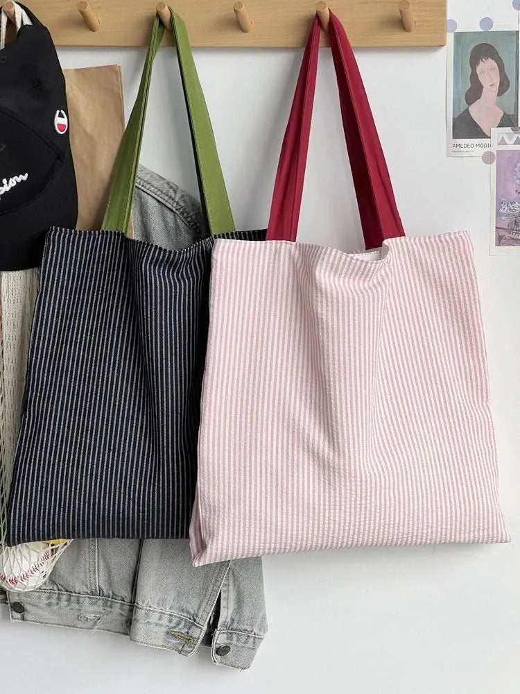 Canvas tote shoulder bag in plaid or striped design with multi-layer compartments