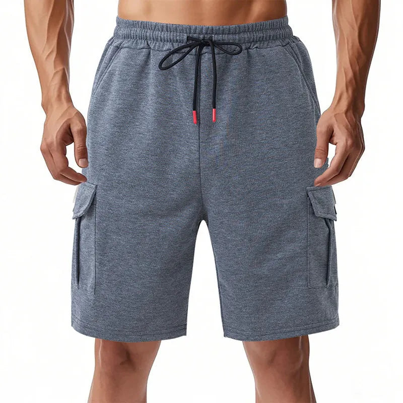 Heavy terry fabric cargo sports shorts with multiple pockets in light grey colour showing loose fit design