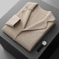 Men's loose fit cashmere cardigan jacket in light grey on a hanger